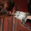 Sprinkles gives Nancy Pederson a kiss